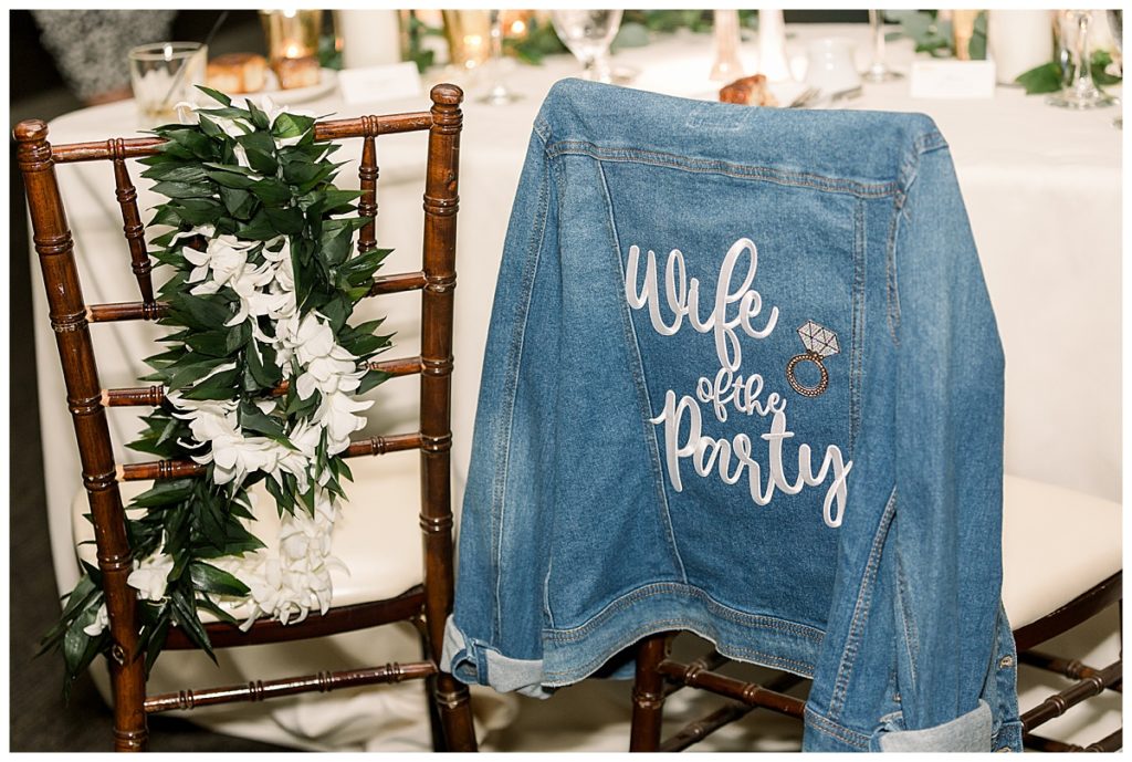 the wife of the party denim jacket on a chair at a fall El Chorro wedding
