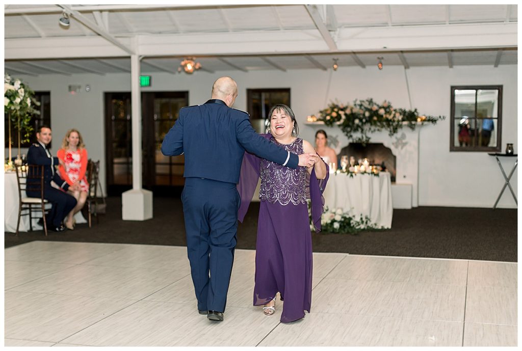 the groom dances with his mom at his fall El Chorro wedding