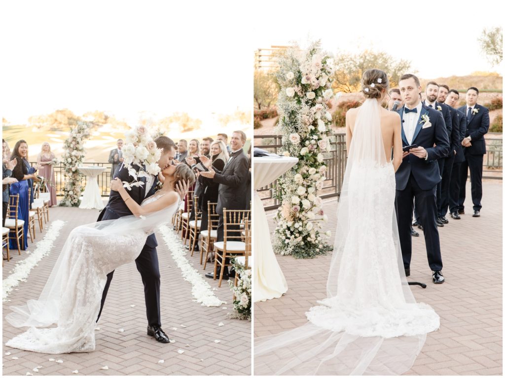 groom dips bride as they process down the aisle of their scottsdale wedding ceremony
